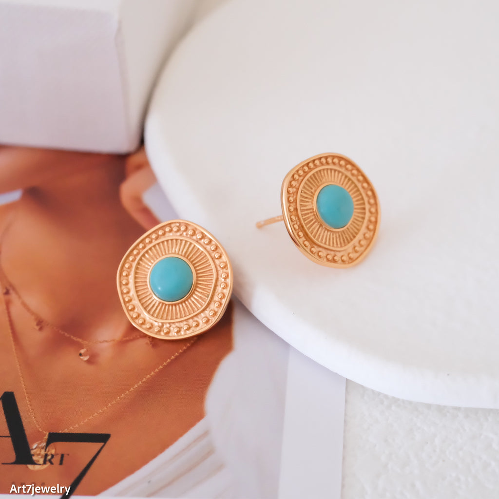 Gold earrings with turquoise stones