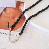 white gold black beaded necklace