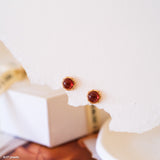 Tiny garnet stud earrings