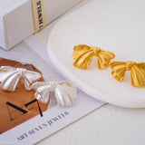 Bold bow stud earrings
