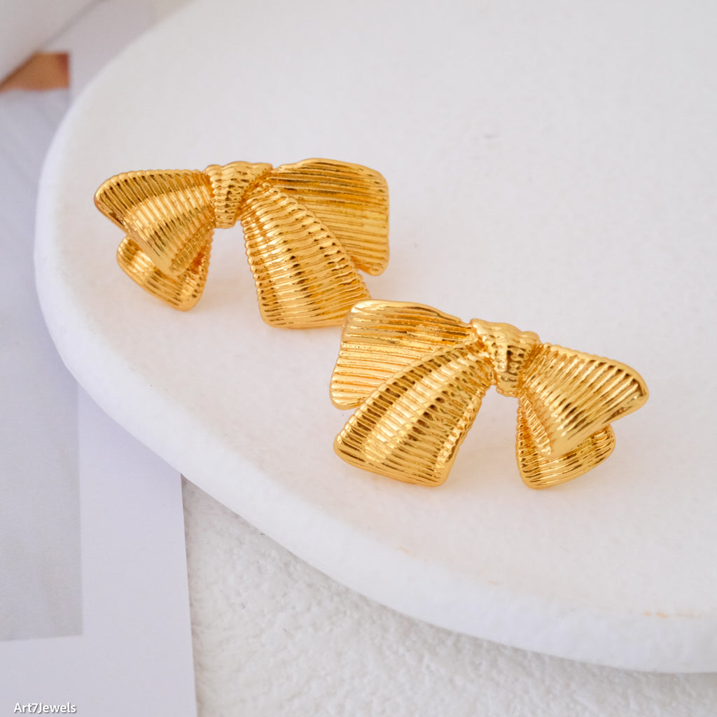 bow stud earrings