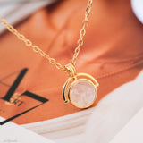 Dainty gold moonstone necklace,