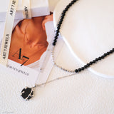Dainty white gold onyx necklace