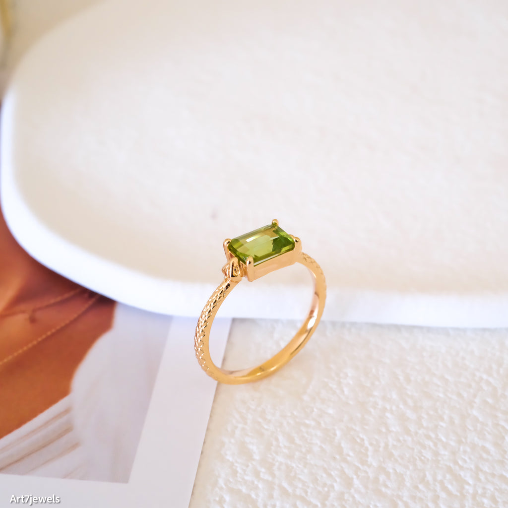 Dainty baguette peridot ring