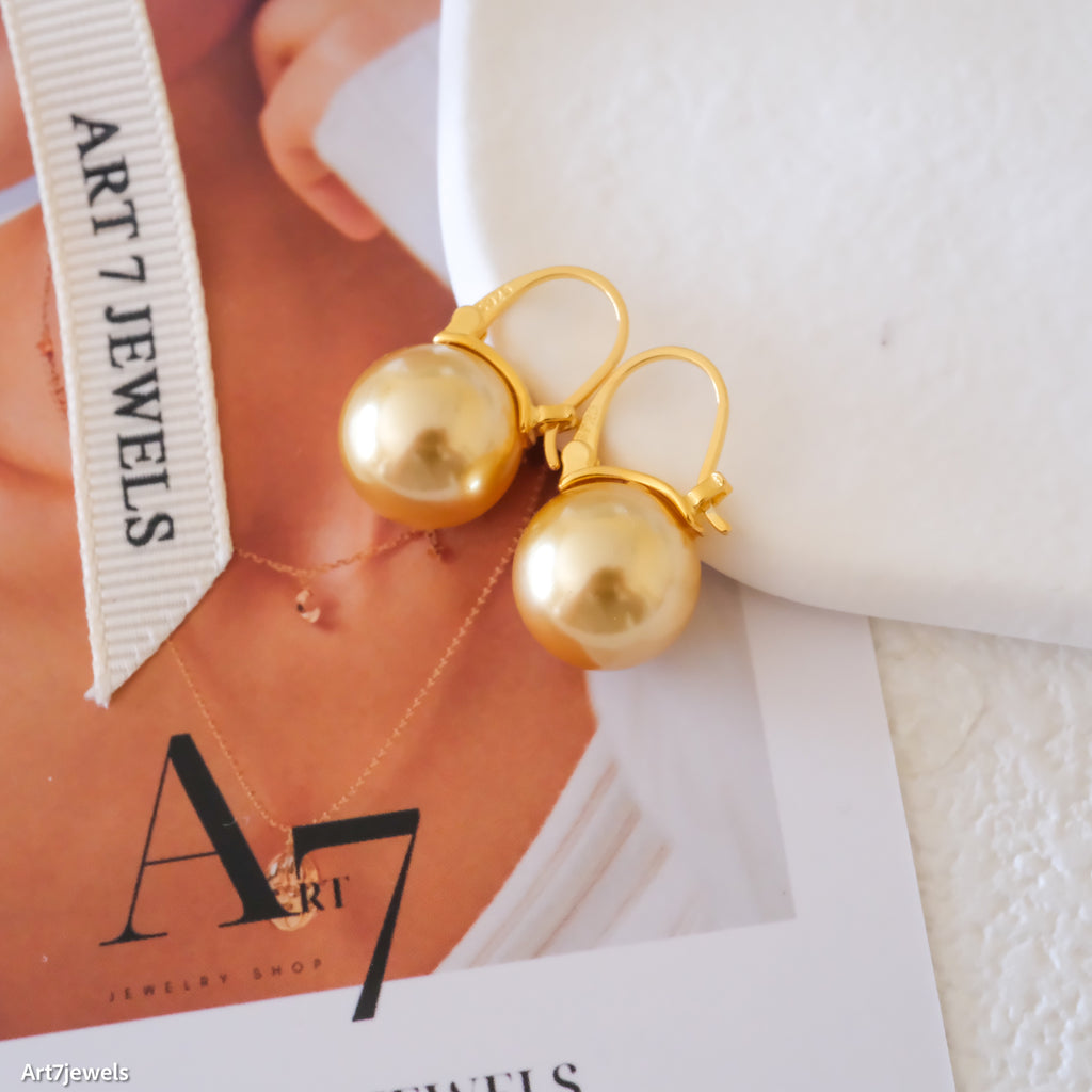 Gold pearl drop earrings