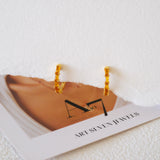 Huggie citrine earrings