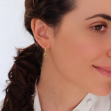 Tiny peridot hoop earrings