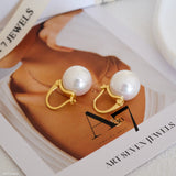 12mm white pearl earrings, crafted to enhance any outfit with their stunning luster. Perfect for everyday wear or special occasions like weddings and bridesmaid ensembles