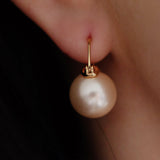 Pink pearl earrings