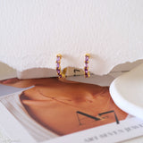 Lab-created amethyst hoop earrings with purple baguette gemstones and gold-tone huggie hoops for women