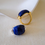 Lapis lazuli ring with deep blue gemstone and polished silver setting, blue stone statement ring for women