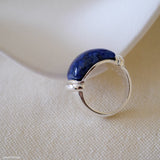Lapis lazuli ring with deep blue gemstone and polished silver setting, blue stone statement ring for women