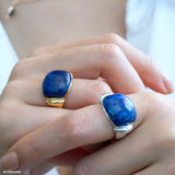 Lapis lazuli ring with deep blue gemstone and polished silver setting, blue stone statement ring for women