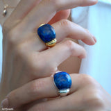 Lapis lazuli ring with deep blue gemstone and polished silver setting, blue stone statement ring for women