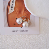 12mm white pearl drop earrings for women with round pearls and silver-tone leverback setting