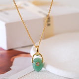 Natural green jade necklace with gold pendant setting and zirconia accent, elegant minimalist jewelry art7jewels