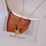 Gold necklace with star pendant on a display card with 'A7Jewels' branding.