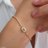 Gold citrine tennis bracelet with natural rectangular citrine center stone surrounded by small sparkling stones, delicate minimalist gemstone jewelry for women
