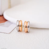 Two tone chunky hoop earrings in gold and silver finish, small thick minimalist huggie earrings, modern mixed metal jewelry for women