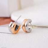 Two tone chunky hoop earrings in gold and silver finish, small thick minimalist huggie earrings, modern mixed metal jewelry for women