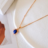 Minimalist natural blue oval lapis lazuli pendant necklace with beaded 18K gold bezel on dainty satellite chain by Art7Jewels