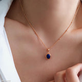 Minimalist natural blue oval lapis lazuli pendant necklace with beaded 18K gold bezel on dainty satellite chain by Art7Jewels