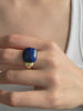 Lapis lazuli ring with deep blue gemstone and polished silver setting, blue stone statement ring for women