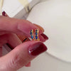 Blue stone hoop earrings with rectangular blue gemstones and gold-tone huggie hoops for women