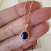 Minimalist natural blue oval lapis lazuli pendant necklace with beaded 18K gold bezel on dainty satellite chain by Art7Jewels